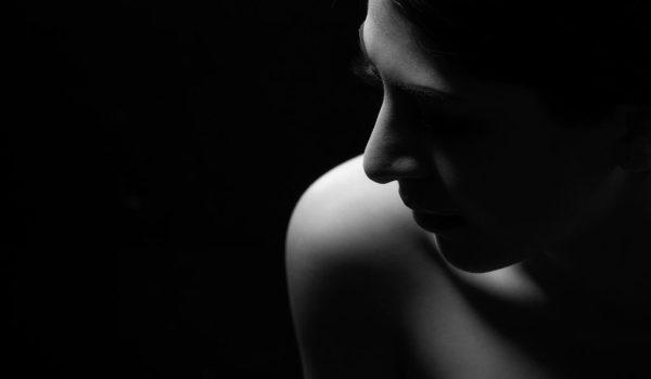 Black and white fashion art studio portrait of beautiful elegant woman. Black and white fashion art studio portrait of beautiful elegant woman.